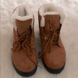 Brownish red colored boots